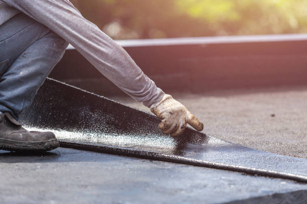 Professional Basement Waterproofing technician working in Austell, GA